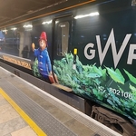 GWR train vinyl wrapped with Padding the bear and print Paddington in Peru