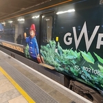 GWR train vinyl wrapped with Padding the bear and print Paddington in Peru