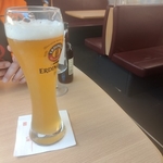 A large glass of Erdinger beer onboard a train restaurant