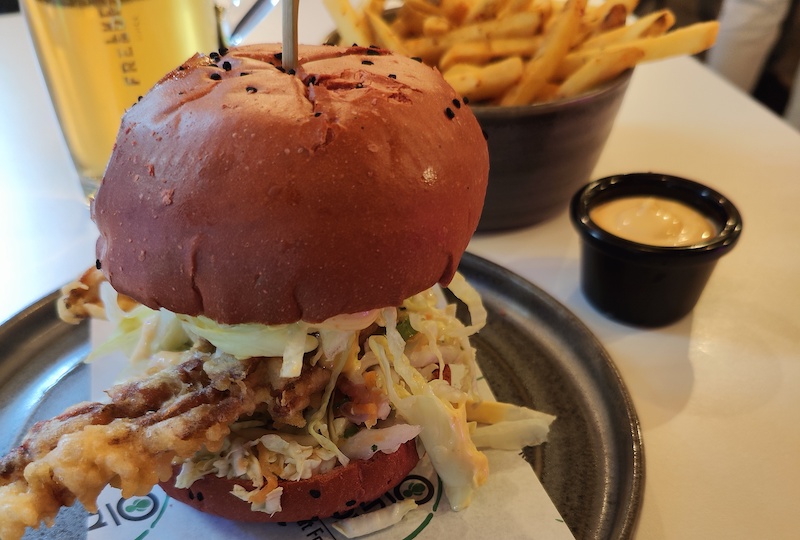 Burger in brioche bun and chips