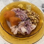 Bright glass plate of ceviche