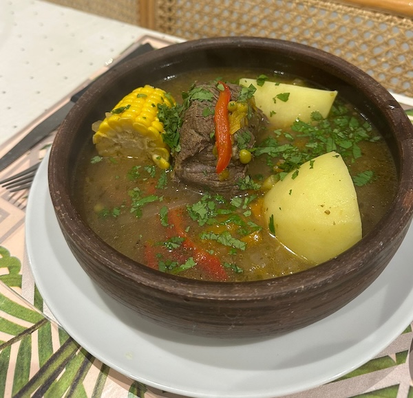 A large brown bowl of cazuela