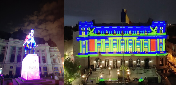 Light projections on horse statue and building in Bucharest