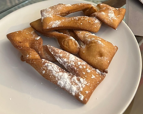 Calzones Rotes scattered with icing sugar