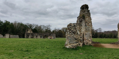 Waverley Abbey beneath a grey sky