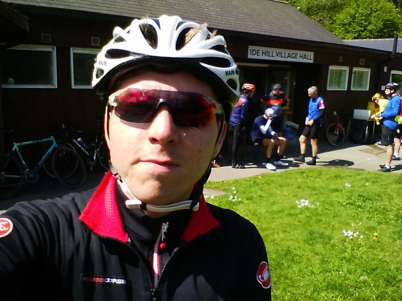 Calum in cycling wear outside Ide Hill village hall