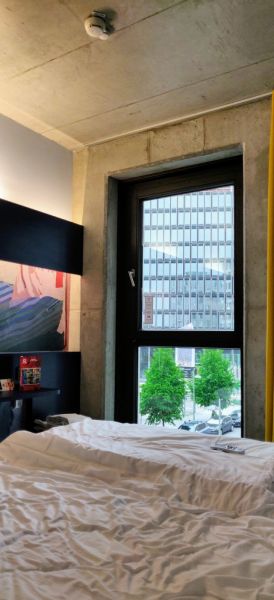 View of MEININGER hotel Berlin East Side Galary. Concrete suite