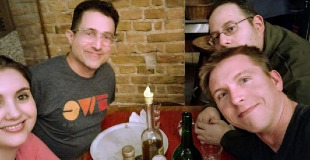 Four people round a table