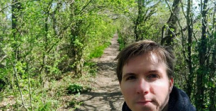 Calum in a tree lined path in the North Tonbridge countryside