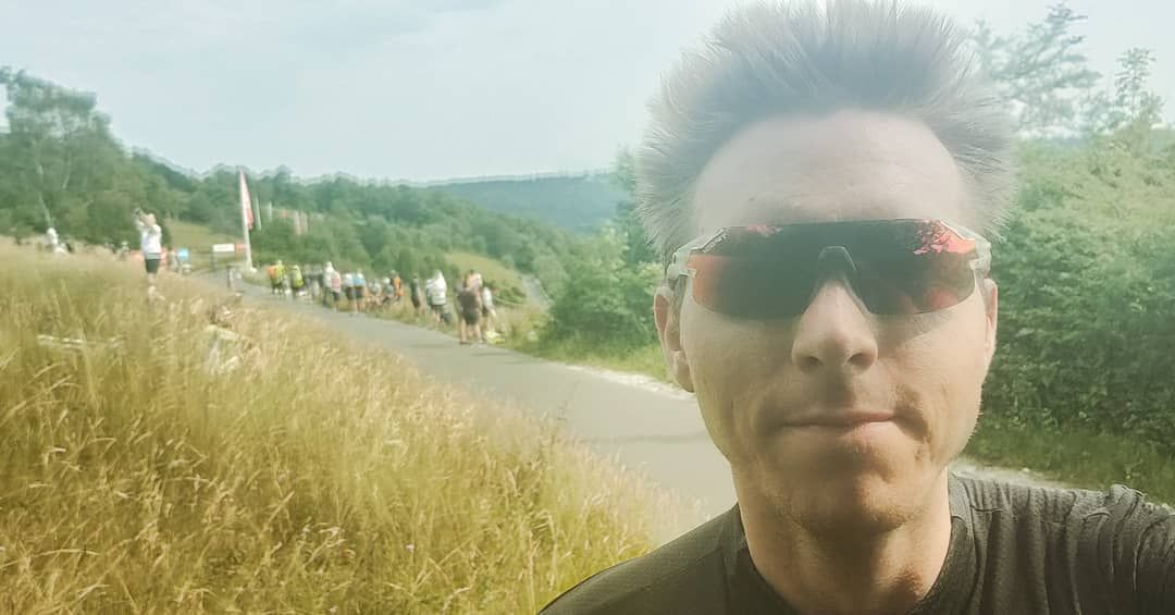 More standing on roadsides watching cyclists